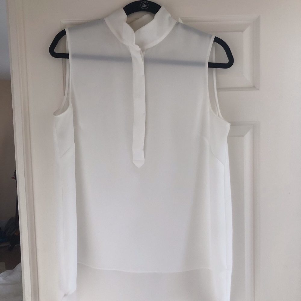 Tahari White sleeveless high low blouse